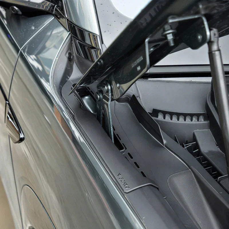 Black protective trim cover for BYD car windshield base, made of durable matte material.