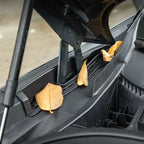 Black durable plastic cowl vent cover protecting car components from fallen dry leaves.