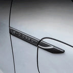 Black carbon fiber door edge protector guard for car door protection.