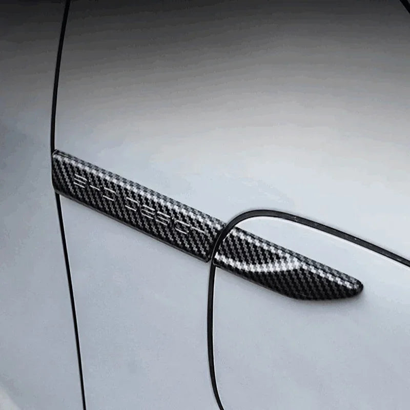 Black carbon fiber door edge protector guard for car door protection.