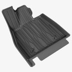 Professional grey carbon-fiber textured car floor mat with deep anti-slip grooves.