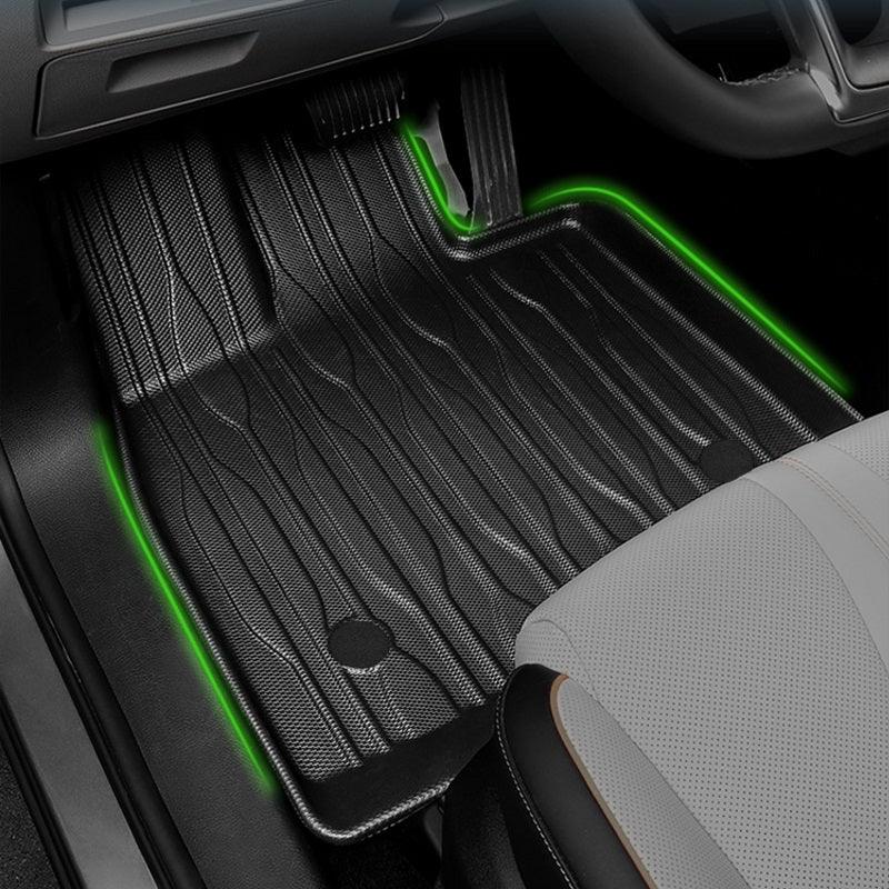 Professional black textured TPE custom car floor mat with waterproof ribbing for interior protection.