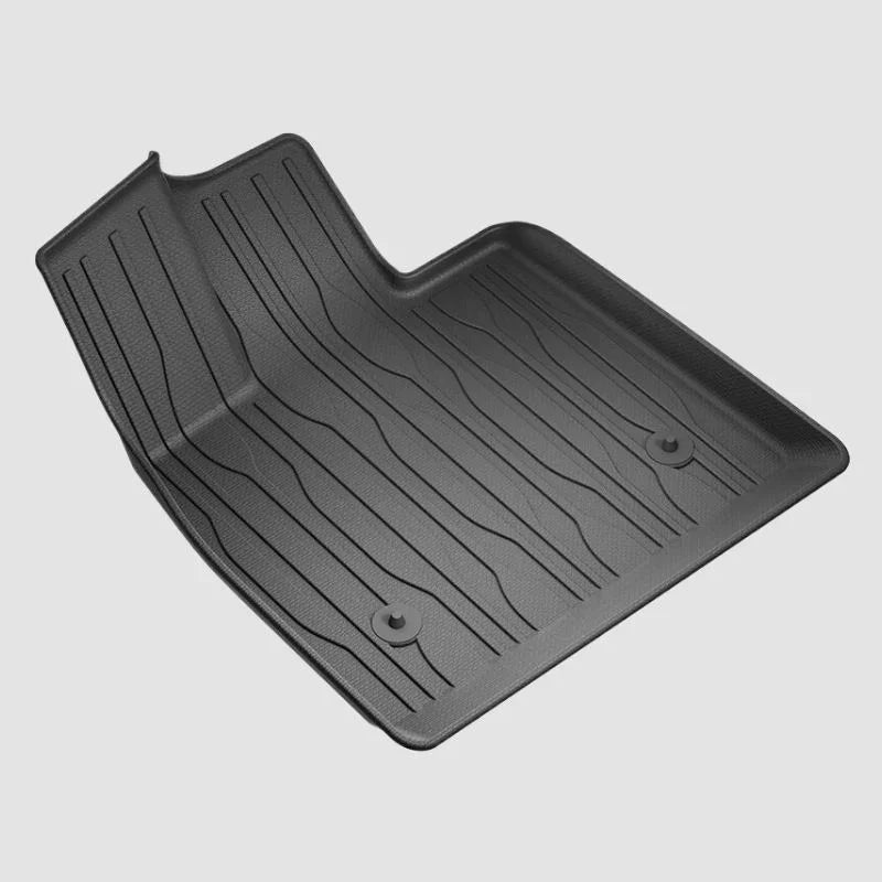 Black heavy-duty TPE car floor mat with textured anti-slip surface and raised edges.