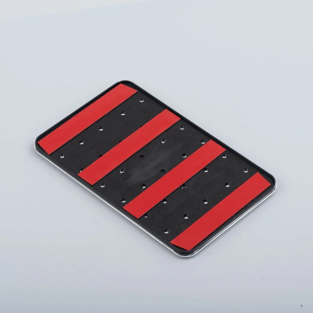 Black and red striped anti-slip floor mat with durable rubber material for car protection.