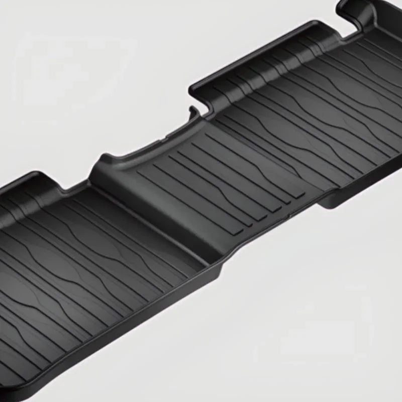 Black heavy-duty TPE floor mats with a textured anti-slip surface for car protection.