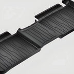 Black heavy-duty TPE floor mats with a textured anti-slip surface for car protection.
