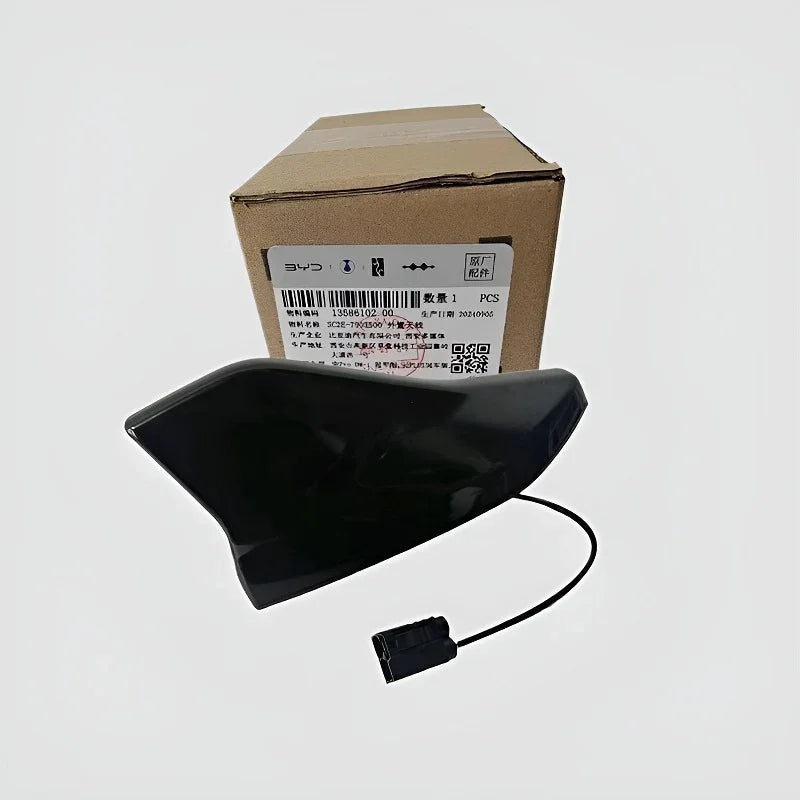 Black replacement side mirror cover with integrated electrical connector and original packaging.