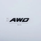 Glossy black 3D AWD car emblem badge with dimensions 6.6cm x 1.3cm