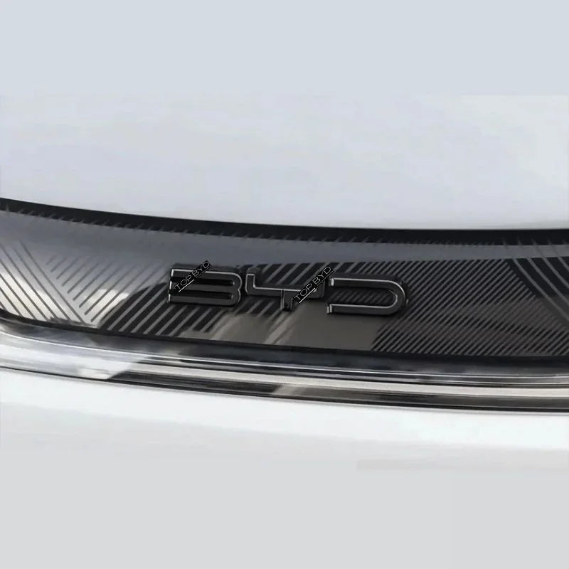 Black carbon fiber texture decorative trim for BYD vehicle interior accents.