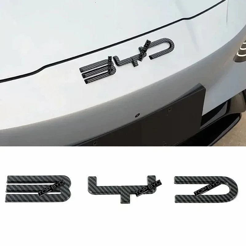 Black carbon fiber pattern BYD emblem decals for car exterior styling.