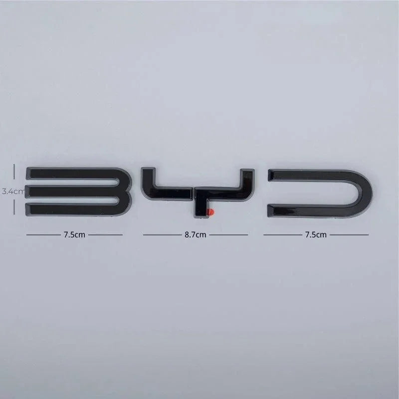Black BYD emblem with chrome accents and dimensions showing 3.4cm height and 23.7cm width.
