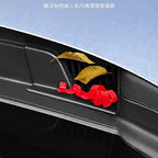 Red protective plastic trim preventing debris and leaves from entering car vents.