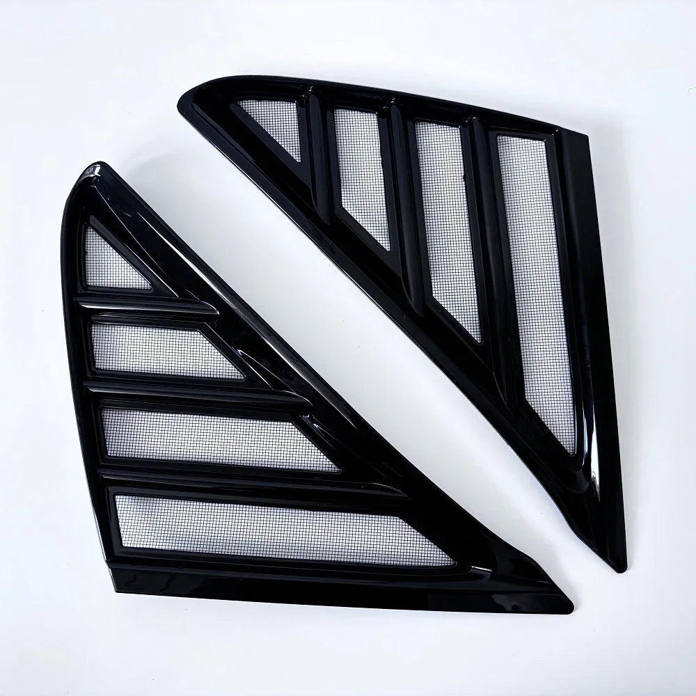 Pair of sleek black gloss aftermarket window vent deflectors for BYD vehicles.