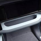 Light grey leather center console storage tray with precise stitching for BYD interior.