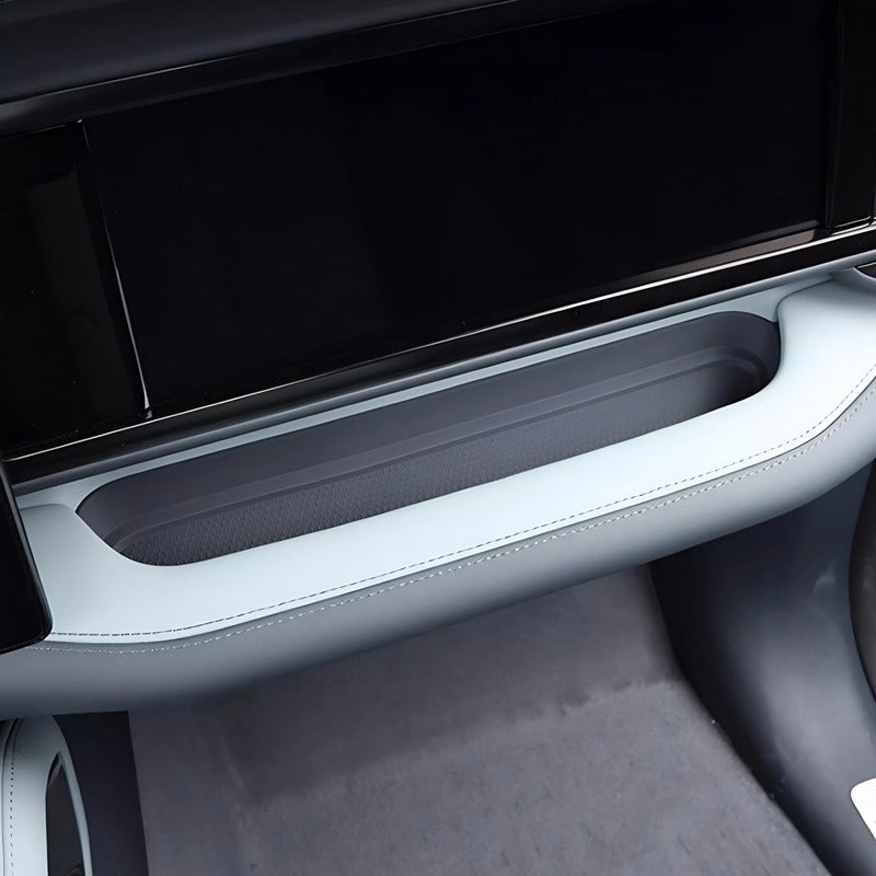 Light grey leather center console storage tray with precise stitching for BYD interior.