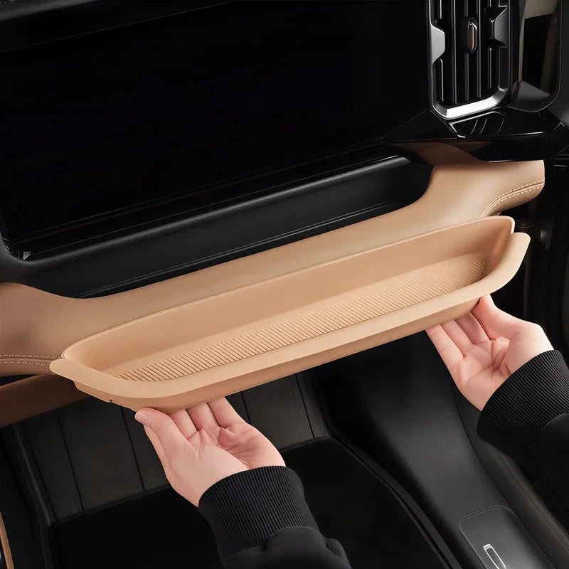 Tan leather-textured dashboard tray for BYD, providing a custom storage solution.