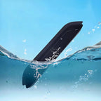 Waterproof black matte car floor mat partially submerged in clear blue water.