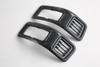 Pair of premium black carbon fiber patterned interior trim accessories for BYD vehicles.