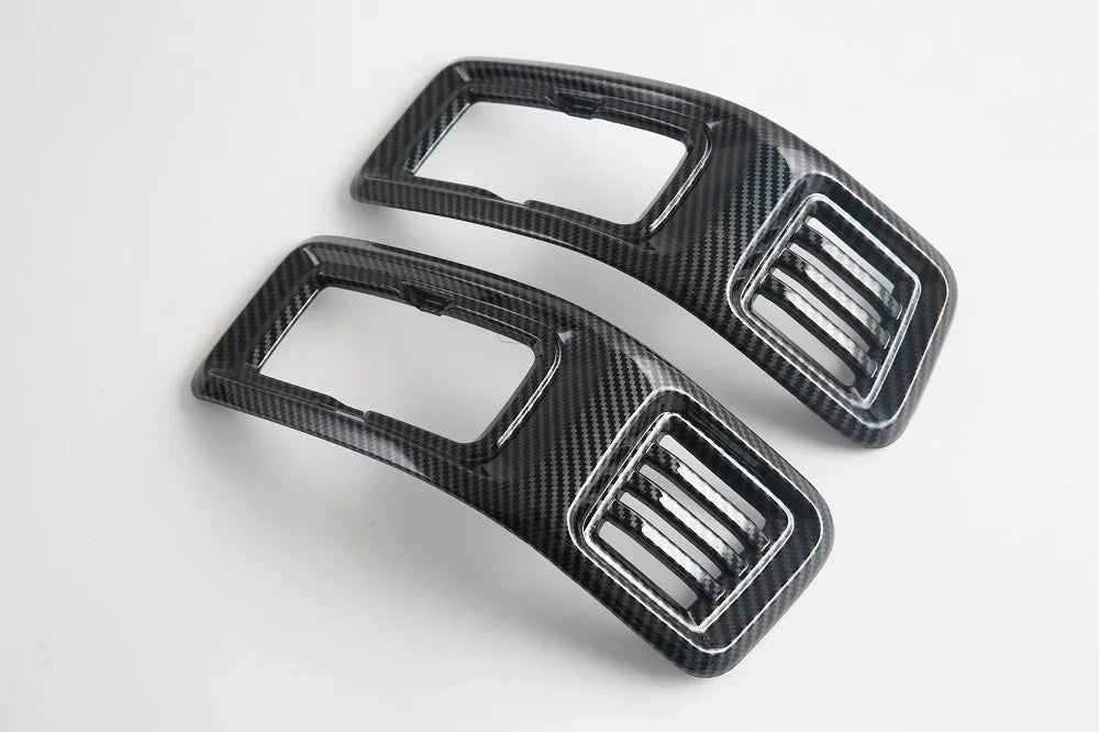 Pair of premium black carbon fiber patterned interior trim accessories for BYD vehicles.