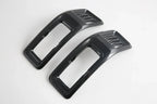 Pair of black carbon fiber texture interior trim covers for automotive enhancement.