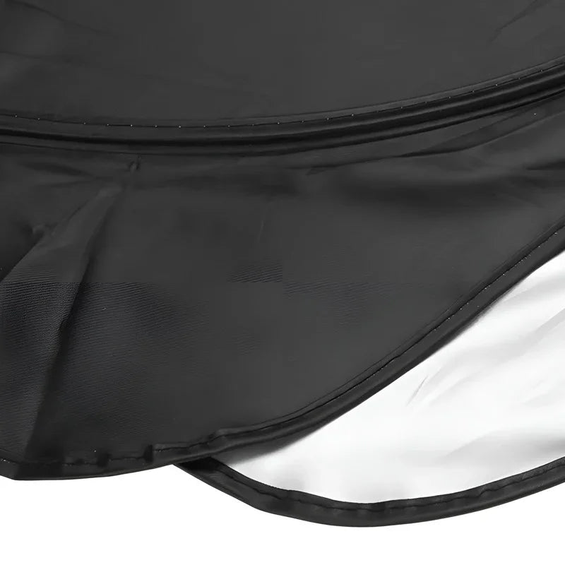 Durable black waterproof fabric car cover material with reinforced edge stitching.