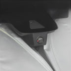 Black textured protective cover with a built-in red indicator light for car interior accessories.