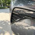 Sleek black mesh vent trim detail on a grey BYD vehicle bumper.