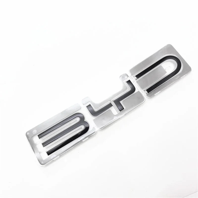 Silver and black chrome BYD car emblem with a clear protective coating
