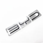 Silver and black chrome BYD car emblem with a clear protective coating