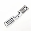 Chrome silver BYD emblem badge with black inlay for premium car exterior styling.