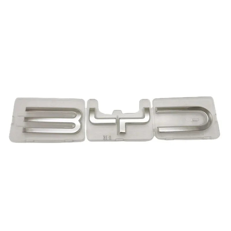 Silver metallic BYD car emblem logo with a polished chrome finish