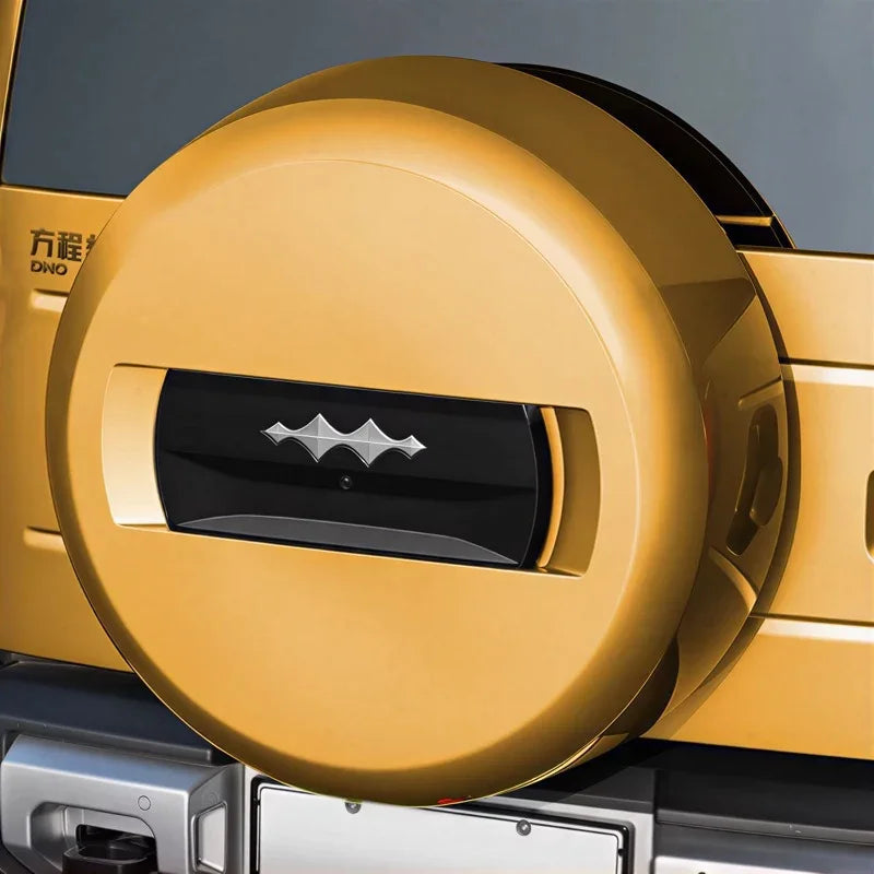 Gold metallic spare tire cover with black accent design for BYD DMO series.