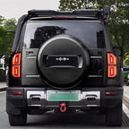 Rear view of a black BYD FangChengBao off-road SUV featuring a matte black spare tire cover.