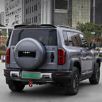 Grey BYD Tang SUV featuring a custom matte grey spare tire cover and rugged rear bumper design.