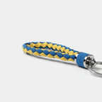 Braided blue and yellow leather keychain with a durable metallic ring.