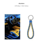 Braided Alcantara keychain in premium blue and yellow colors for car key accessories.