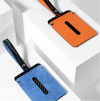 Premium suede car hanging tags in vibrant orange and blue with carbon fiber texture accents.