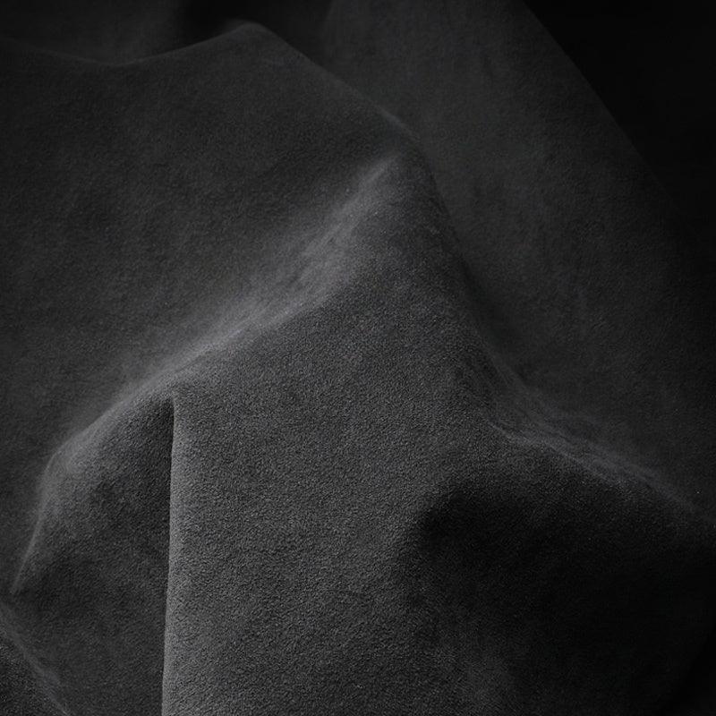 Premium black suede microfiber fabric texture for luxury BYD car interior accessories.