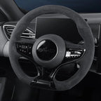 Black suede and perforated leather texture steering wheel cover for BYD car interior.