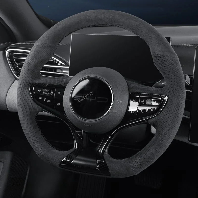 Black suede and perforated leather texture steering wheel cover for BYD interior protection.