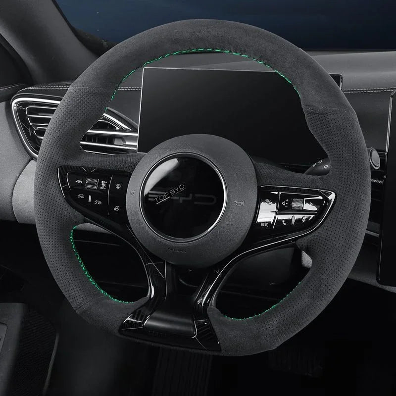 Black Alcantara steering wheel cover with vibrant green contrast stitching for BYD.