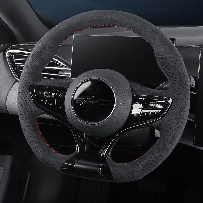 Black Alcantara steering wheel cover with red contrast stitching for BYD interior protection.