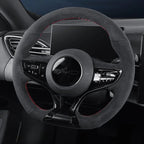 Black Alcantara steering wheel cover with red contrast stitching for BYD interior protection.