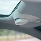 Gray premium textured interior trim component installed near the car sunroof.