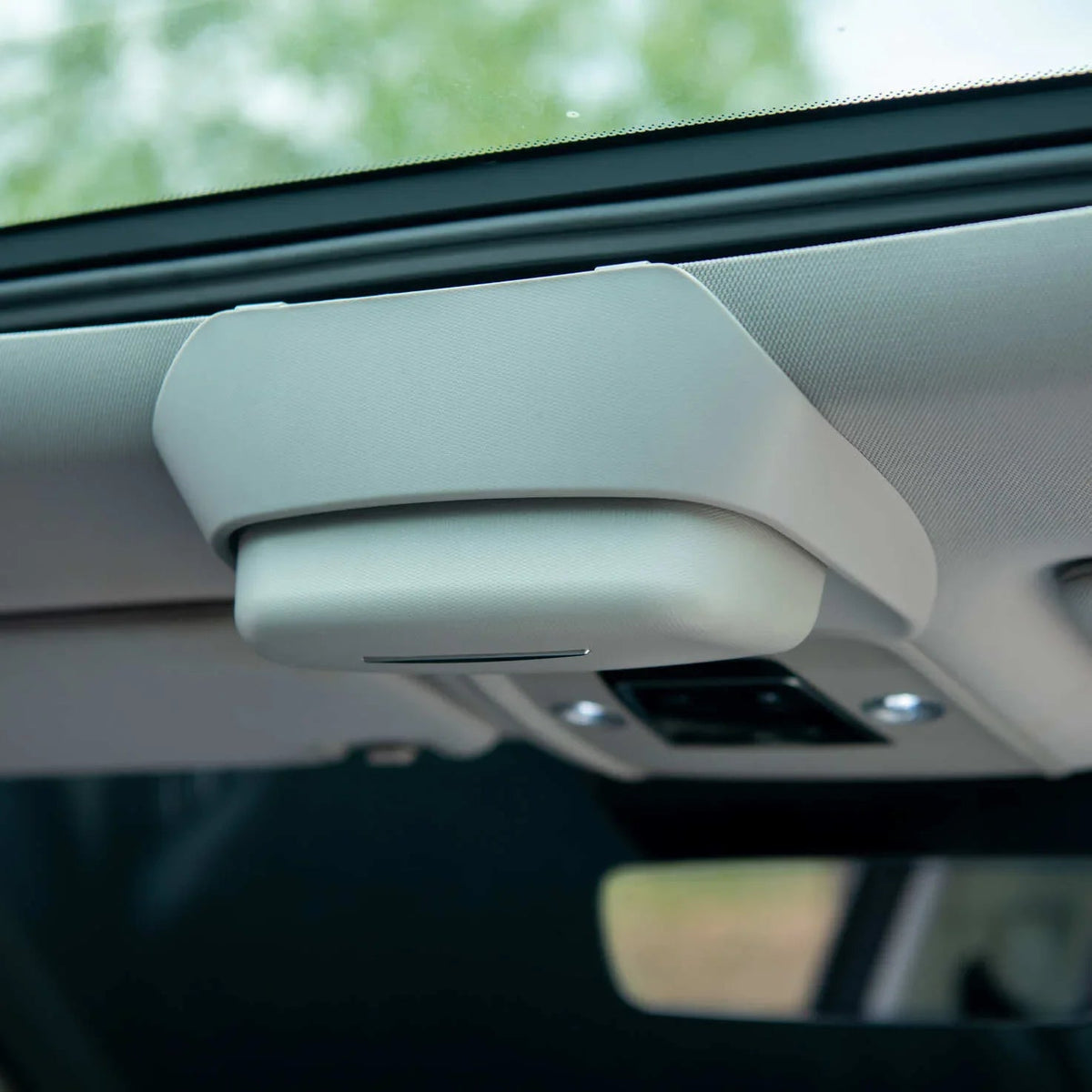 Light beige premium textured interior trim component for BYD vehicle ceiling.