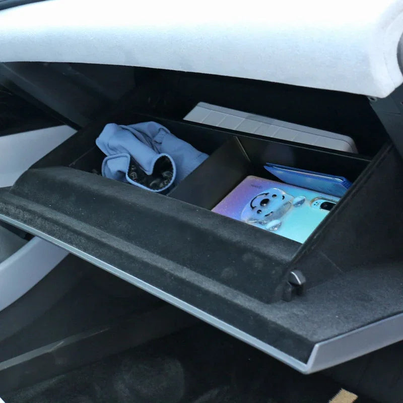 Black velvet-lined center console organizer for BYD car with storage compartments.