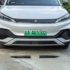Black textured anti-slip door sill protectors for white BYD vehicle front bumper area.