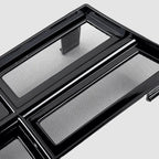 Close-up of a glossy black car accessory featuring a durable metal mesh screen.