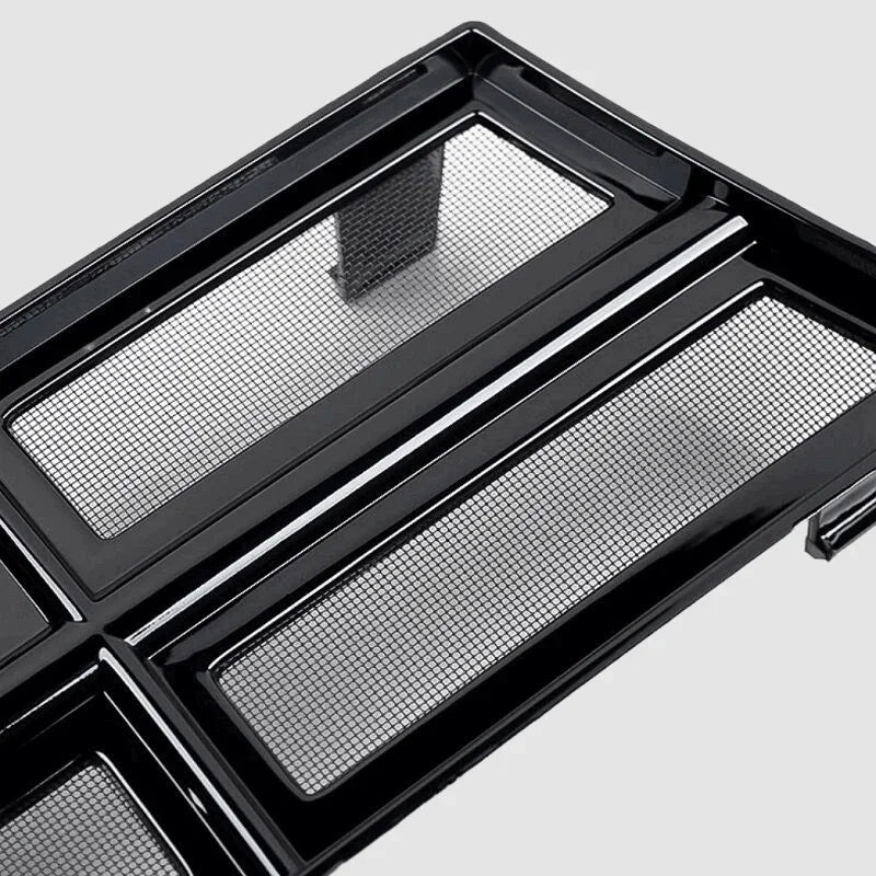 Close-up of a glossy black car accessory featuring a durable metal mesh screen.