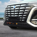 Front view of a black car featuring a premium chrome-accented wide grille and sleek headlights.